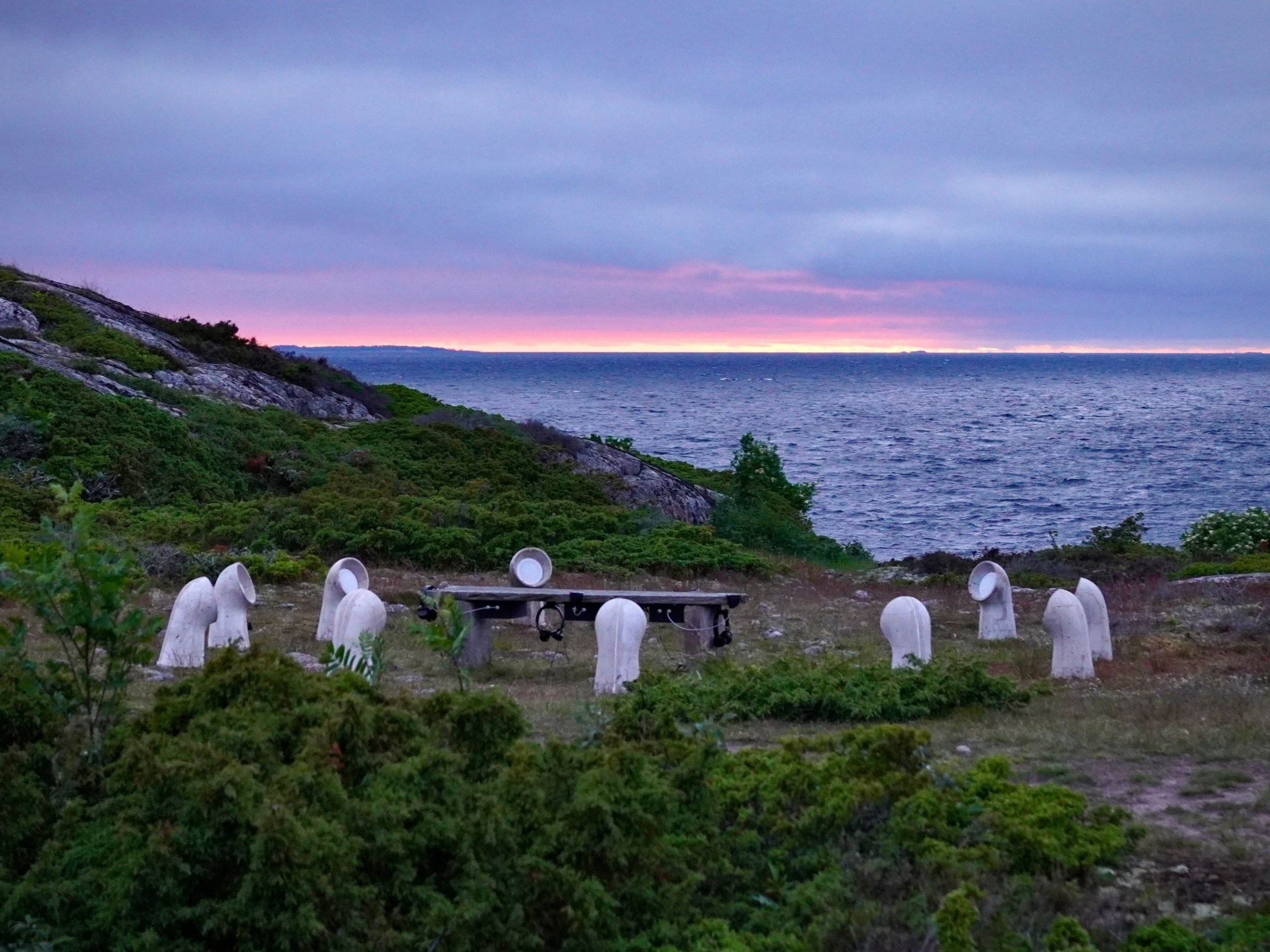INTER, Jurmo listening installation facing the Baltic Sea at dusk.