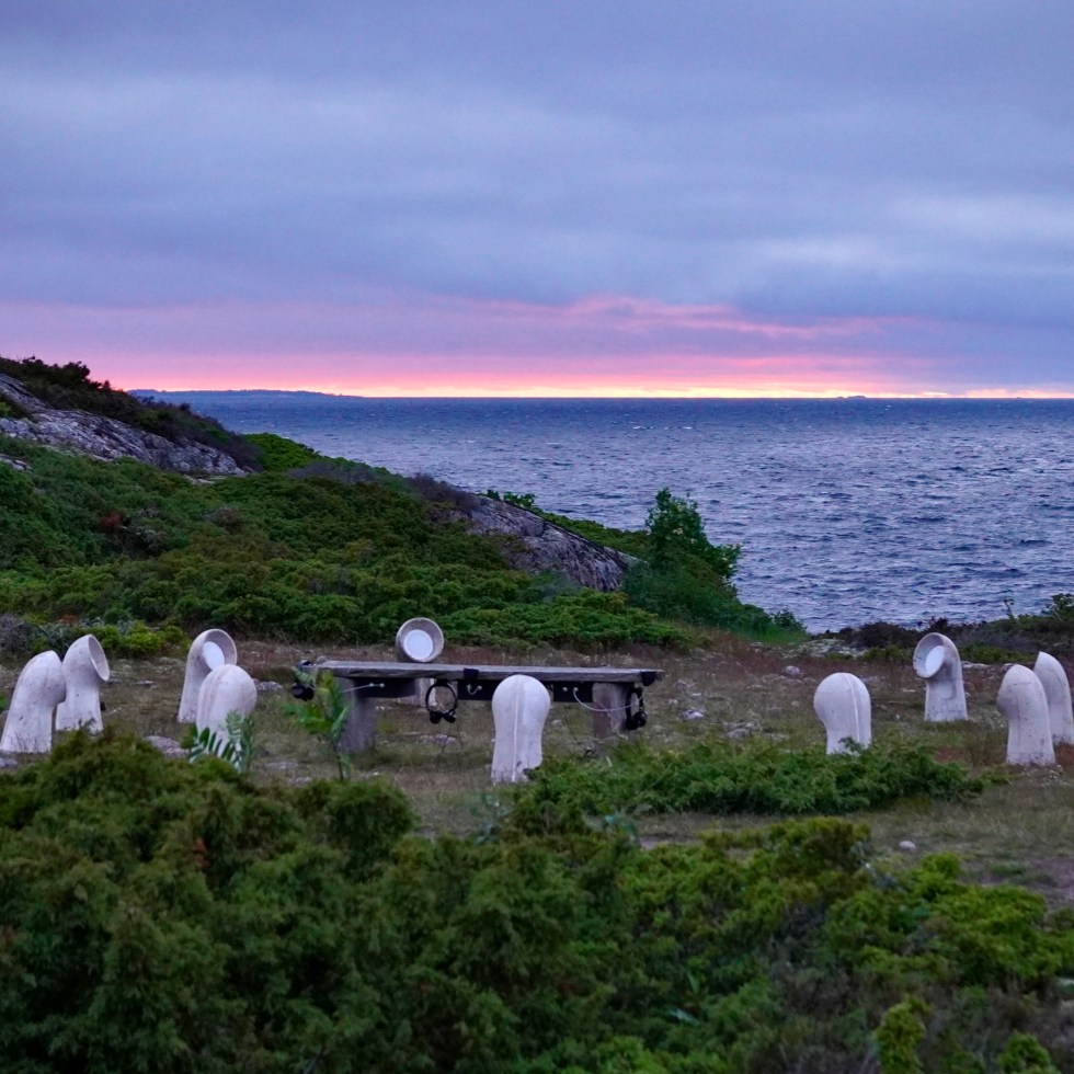 INTER, Jurmo listening installation facing the Baltic Sea at dusk.
